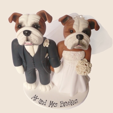 Wedding cake topper of couple as cute dogs