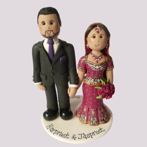 Wedding cake topper of Indian couple